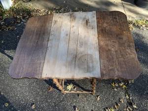 lot 429 image: Wood drop-leaf table on casters (needs new wheels) P