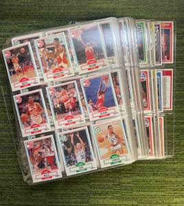 lot 99 image: 1990 Fleer Basketball Set in pages