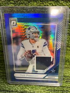 lot 25 image: 2024 Panini Optic Blue Hyper Dak Prescott Threads Jersey Relic