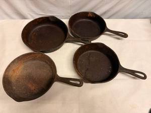 lot 21 image: 3-8 Cast Iron Pans & 1-9 Cast Iron Pan