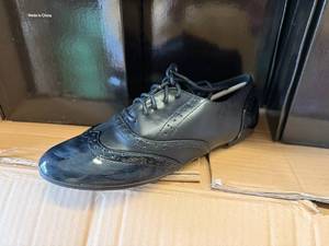 lot 55 image: 8 Cases of Shoes-Brown & Black