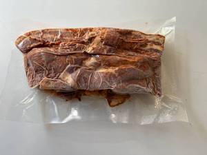 lot 79 image: BB. 2lbs OlSmokehouse Honey Orange Uncured Bacon Ends & Pieces