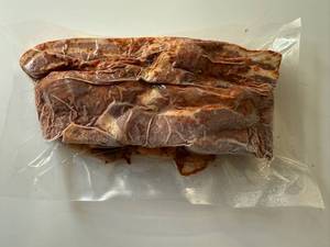 lot 82 image: BB. 2lbs OlSmokehouse Honey Orange Uncured Bacon Ends & Pieces