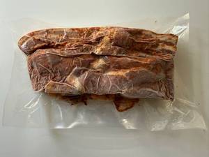 lot 84 image: BB. 2lbs OlSmokehouse Honey Orange Uncured Bacon Ends & Pieces