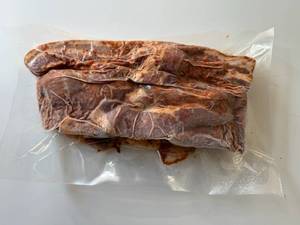 lot 86 image: BB. 2lbs OlSmokehouse Honey Orange Uncured Bacon Ends & Pieces