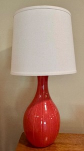 lot 21 image: Orange Ceramic Table Lamp with White Shade