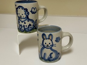 lot 35H image: Set of 2 M.A. Hadley Pottery Mugs with Bunny and Dog Designs