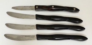 lot 41 image: Set of 4 Cutco Kitchen Knives with Black Handles
