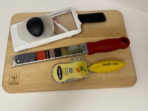 lot 61A image: PTRY - Wusthof 14x10 Cutting Board with Mandoline Slicer and Microplane Zesters