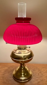 lot 148 image: LL - Vintage Brass Oil Lamp with Ribbed Red Glass Shade
