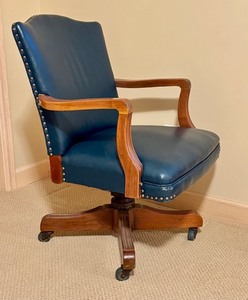 lot 155 image: LLO- Vintage Blue Leather Office Chair with Wood Frame and Casters