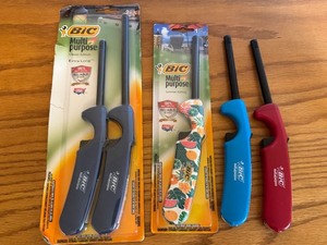 lot 209 image: LLO - Lot of 4 BIC Multi-Purpose Lighters Assorted Colors and Designs