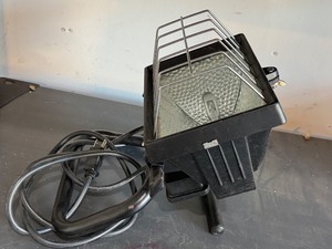 lot 236 image: G - Outdoor Flood Light with Protective Cage and Mounting Bracket
