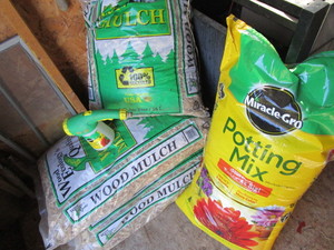 Wood Mulch, Miracle Gro Potting Soil