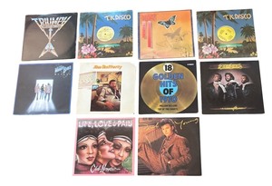 lot 84A image: LR - Lot of 10 Vinyl Record Albums including Heart, Paul Young, Bee Gees and More