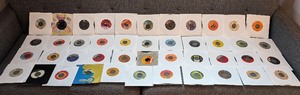 lot 153 image: UL - Collection of Vintage 45 RPM Records with Sleeves