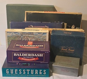lot 251K image: LL - Collection of Vintage Board Games Including Trivial Pursuit, Monopoly, Scrabble, and More