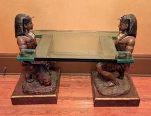 lot 10 image: ML - Pair of Metal Egyptian Revival Pharaoh Sculptures  Egyptian Revival Metal Pharaoh Figurines Glass Top Coffee Table