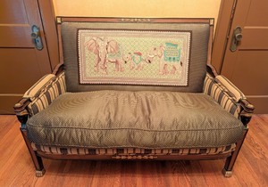 lot 18 image: ML - Antique Settee with Elephant Needlepoint Backrest and Carved Accents