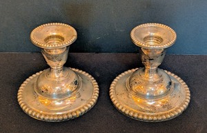 lot 79 image: ML - Pair of Vintage Candlewick International Sterling Weighted Candleholders