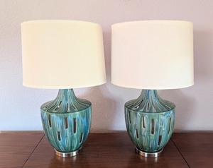 lot 130 image: UL - Pair of 26 Ceramic Table Lamps with Blue Glaze and Cutout Design