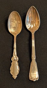 lot 204A image: ML - Pair of Sterling Silver Collector Spoons with Ornate Handles