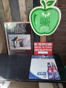 lot 20 image: Metal Signs, Revel Stoke , Not Trespassing, Blue Light, and Federal Duck stamp print