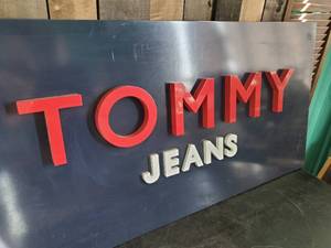 lot 32 image: Large Tommy Jeans Advertizing Sign 3D Right from the vintage clothing shop