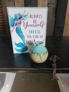 lot 61 image: Mermaid Dcor Lot  Small Cast Iron Mermaid Vase and Wall hanging Dcor