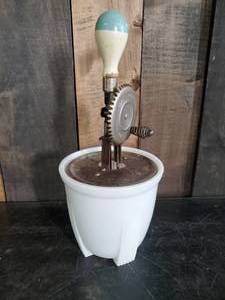 lot 68 image: Vintage Hand Beater with Milk Glass Bottom