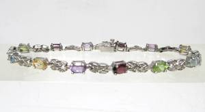 lot 55 image: Jeweled Sterling Silver & Gemstone Bracelet
