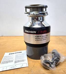 lot 134 image: Brand New Unused EMERSON Model E505 Garbage Disposal
