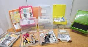 lot 125 image: HUGE Lot of Brand New Scrapbooking Crafting Supplies in Nice Organized Cases
