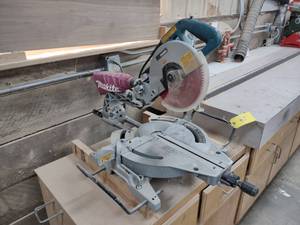 lot 47 image: Makita 10 Sliding Miter Box...