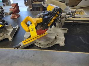 lot 84 image: Dewalt 12 Sliding Miter Saw...