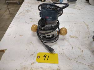 lot 91 image: Bosch 1617 Router...