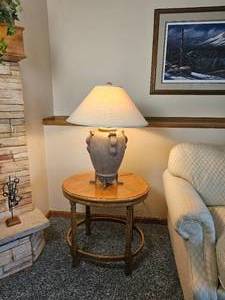 lot 67 image: Rustic Jug Style Lamp with Footed Iron Base