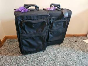 lot 204 image: Tumi Overhead Carry-On Luggage Pair