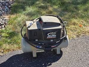 lot 232 image: Mity Mite 2 gal. Electric Air Compressor