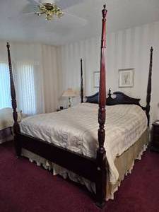 lot 17 image: Gorgeous Vintage Carved Mahogany Poster Bed - King
