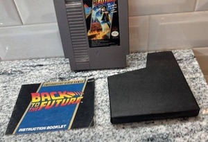 lot 10 image: Back to the Future NES Game Cartridge with Manual and Sleeve
