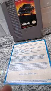 lot 12 image: Knight Rider NES Game Cartridge with Sleeve and Instruction Sheet - Untested