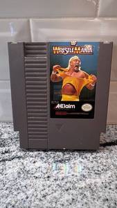 lot 14 image: WWF WrestleMania NES Game Cartridge with Sleeve - Untested