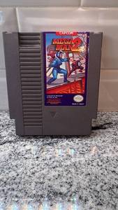 lot 17 image: Mega Man 2 NES Game Cartridge with Protective Case