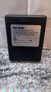lot 28 image: Pac-Man Game Cartridge for Commodore 64 - Atari 1983 - Untested