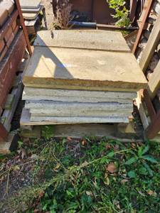 lot 38 image: Stack of 16 Used Concrete Sidewalk Slabs