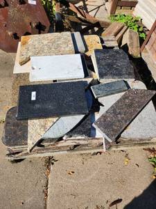 lot 50 image: Collection of Assorted Granite and Stone Countertop Remnants