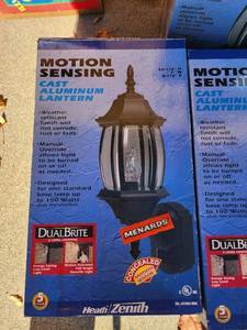 lot 75 image: Set of 3 Heath Zenith Motion Sensing Cast Aluminum Lanterns