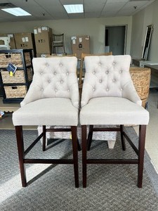 lot 25 image: Safavieh Eleni Tufted Wing Back Bar Stool (Set of 2) - MSRP $545