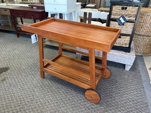 lot 32 image: Safavieh Rezno IndoorOutdoor Bar Cart - MSRP $262